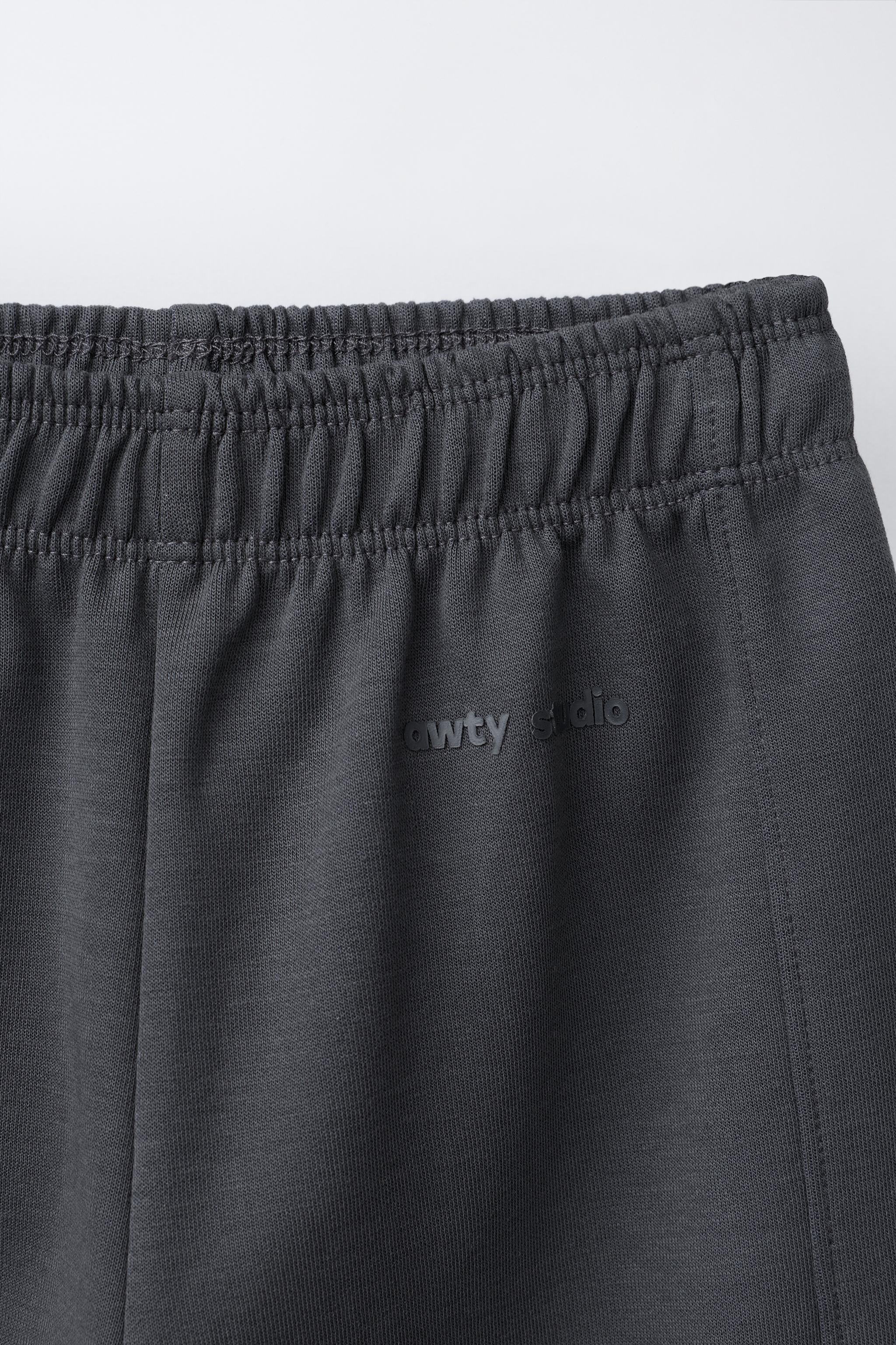 PANTALON WIDE LEG INTERLOCK INSCRIPTION EN RELIEF
